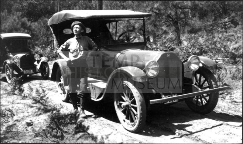 Charles Custis Woolf with 1927 Ford automobile