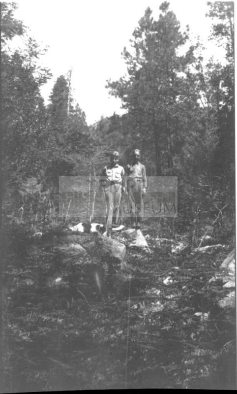 Charles Harold and cousin Bill (?) in forest
