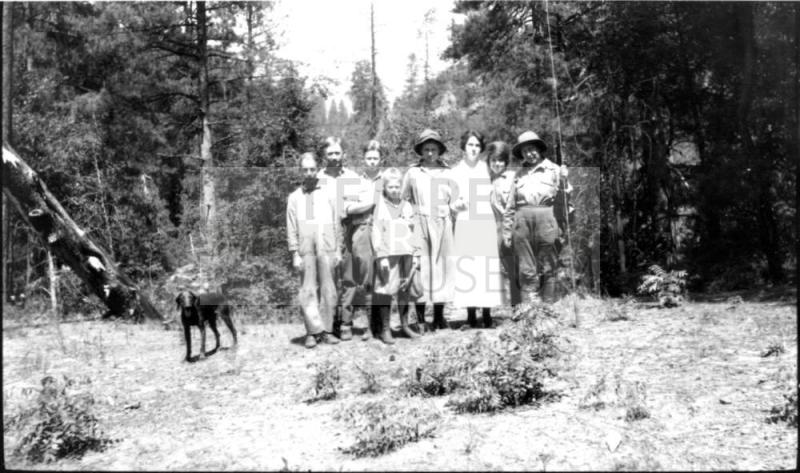 Woolf family group with other family at campsite