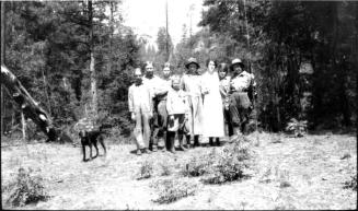 Woolf family group with other family at campsite