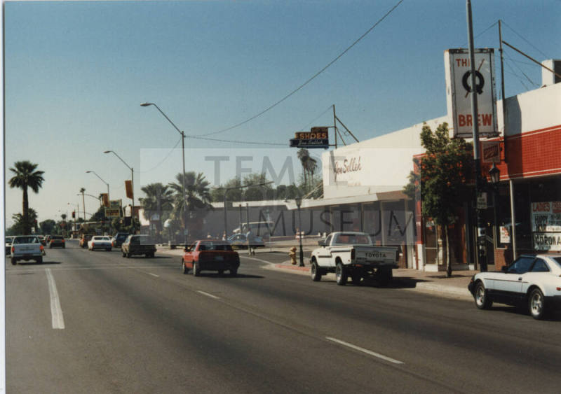 Photograph - Joe Selleh Sporting Goods Store and The Q & Brew on 7th St and Mill
