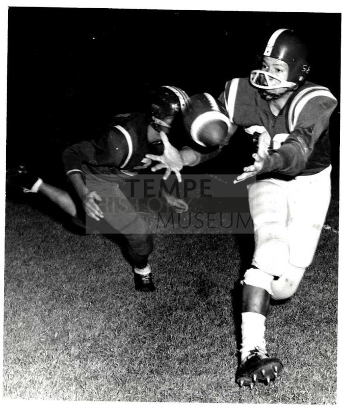 Photograph of Robert Royse Catching a Football