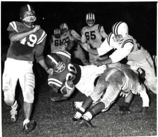 Action Photo of Robert Royse During Football Game
