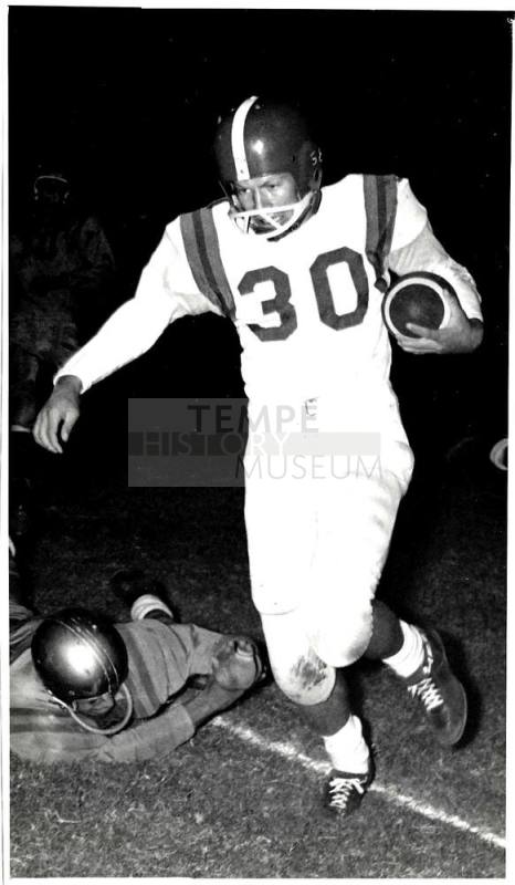 Photograph of Robert Royse Carrying Football
