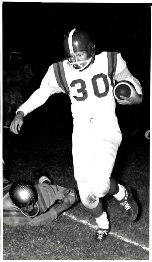 Photograph of Robert Royse Carrying Football