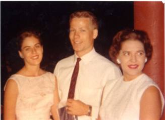 Photograph of Robert Royse, girlfriend Sue Herganrather, and Sally Hergenrather after Gradution