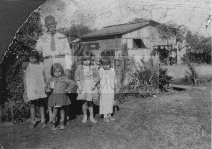 Photograph - Jesus E. Gomez with his grandchildren