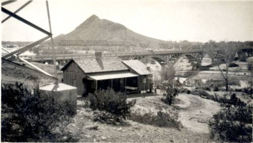 House at north end of Ash Avenue Bridge