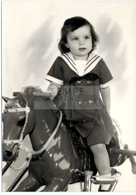 Photograph - Child on plastic horse