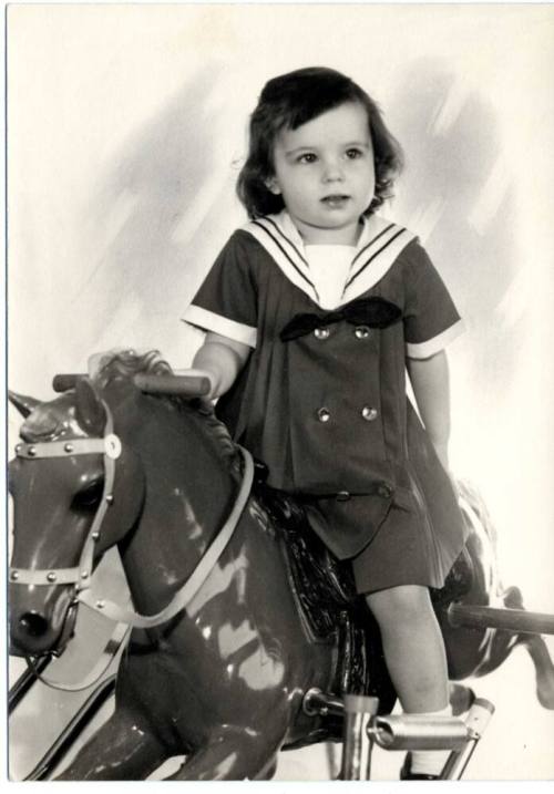 Photograph - Child on plastic horse