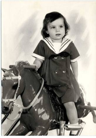 Photograph - Child on plastic horse