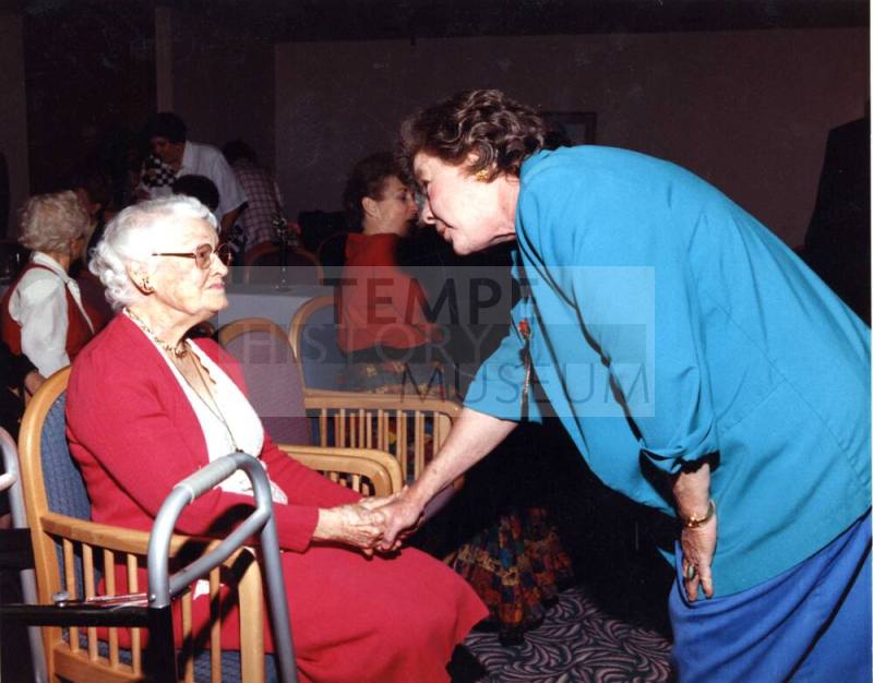 Photograph - Jessie Fisk shaking hands with Ann from Governer's office
