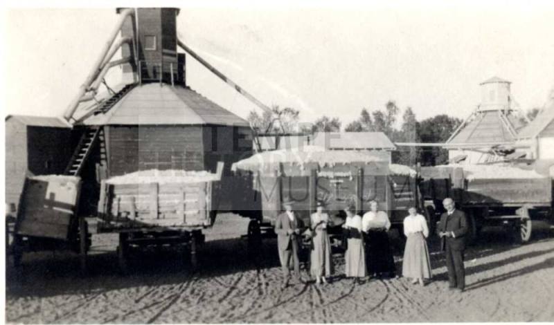 Photograph - Group in front of Cotton Gin