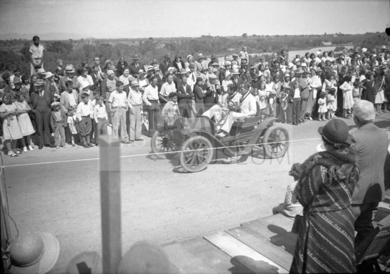 Negative - 2 men in car during parade for dedication of Tempe, Mill Ave Bridge