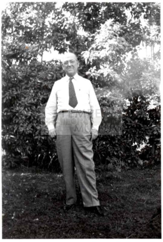 Photo of William Laird standing under trees