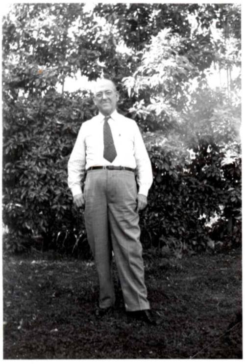 Photo of William Laird standing under trees
