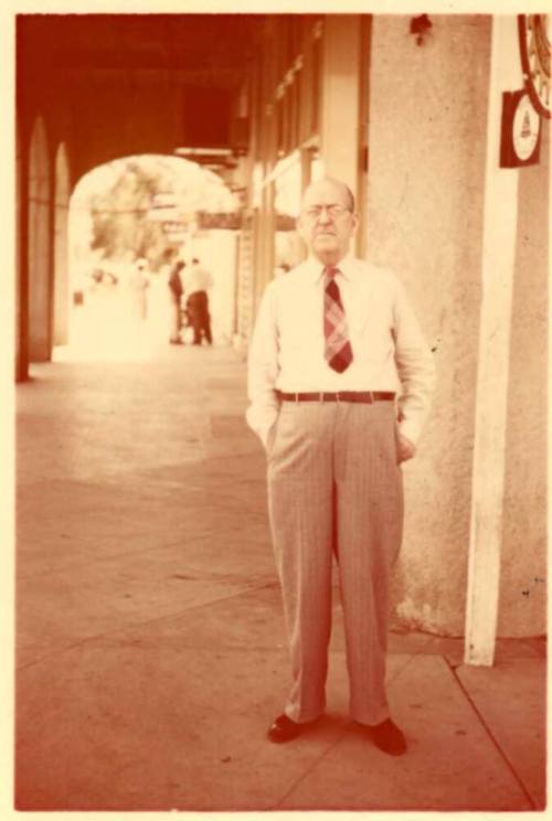 Photo of William Laird standing outside Laird's Drugs