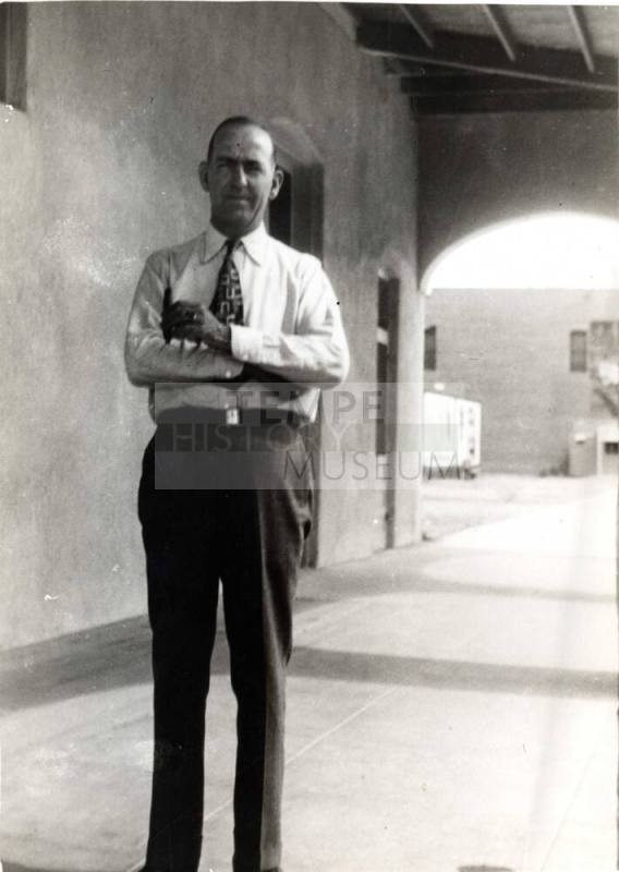 William Laird standing outside of Laird's Drugs, Under the Overhang.