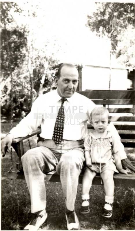 Willaim E Laird and a Small Girl Sitting on a Bench