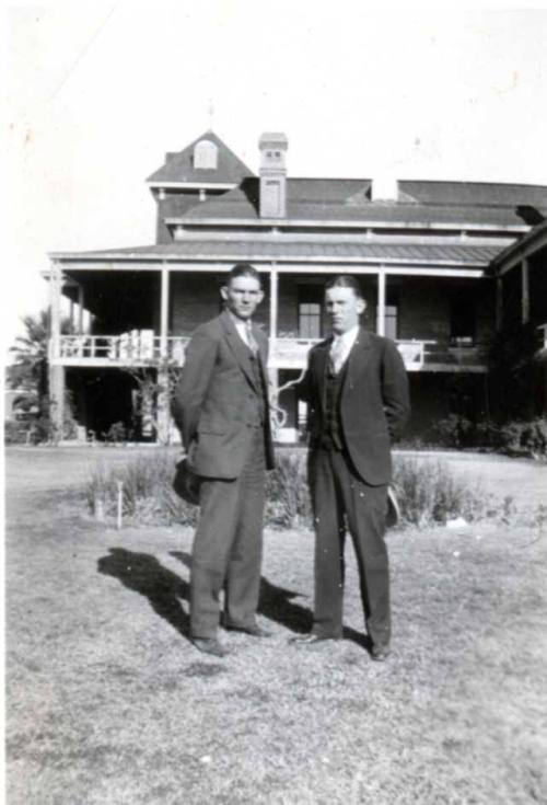 Photo of John and Frank Raymond in front of University of Arizona Tucson Old Main