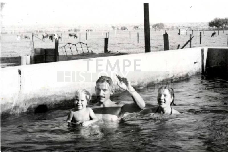 Dickie, Lee, and Blanche Raymond in a Ranch Watering Tank