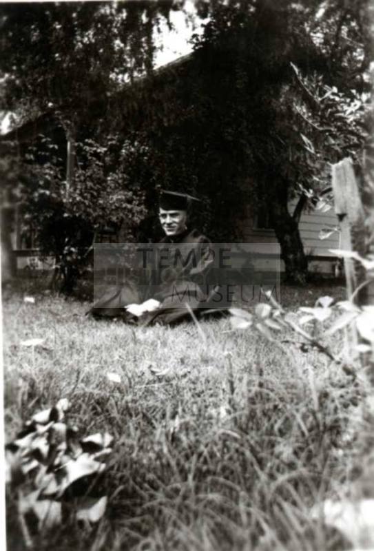 Graduation Photo of Frank Raymond in Cap and Gown