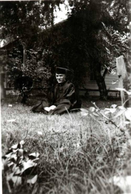 Graduation Photo of Frank Raymond in Cap and Gown