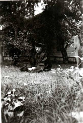 Graduation Photo of Frank Raymond in Cap and Gown