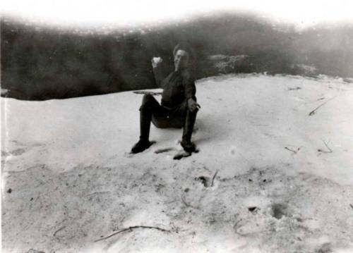 Frank Raymond sitting in the sand