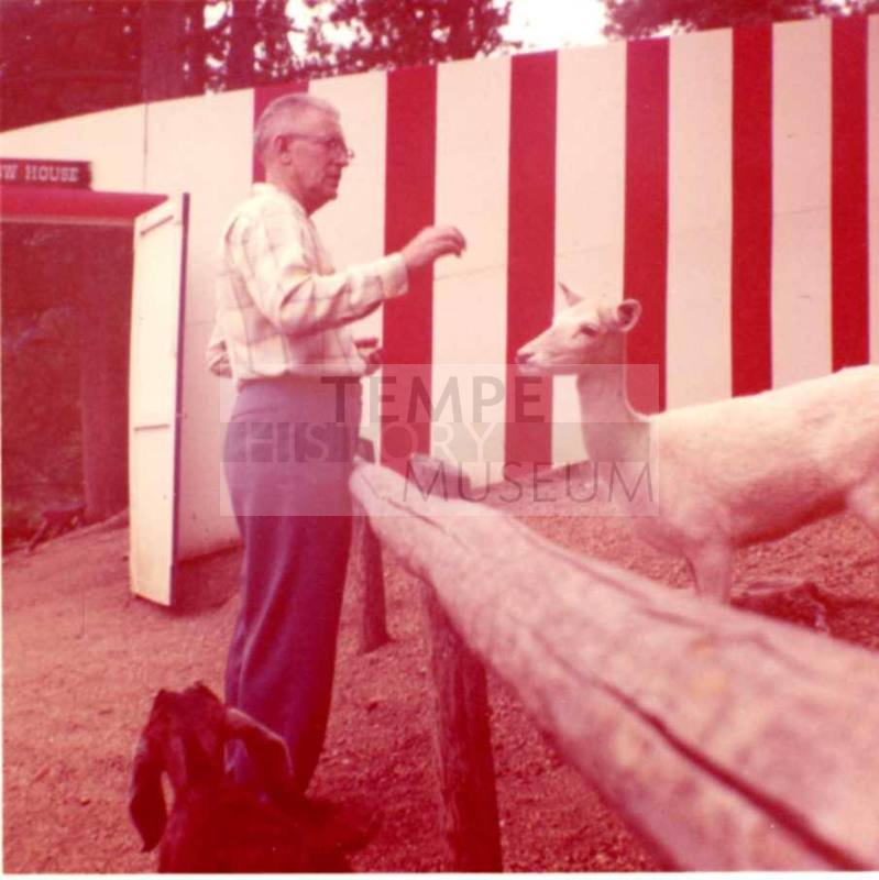 Frank Raymond Feeding Goats