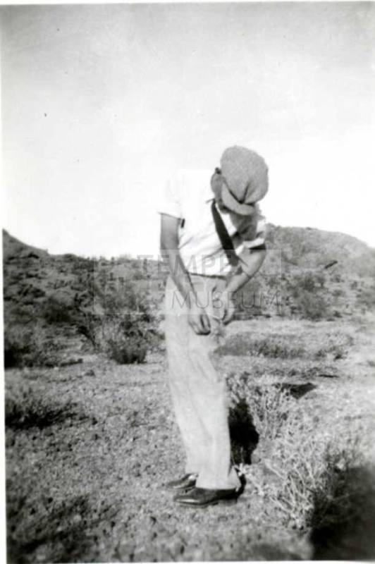 Frank Raymond removing Cactus from his Pants