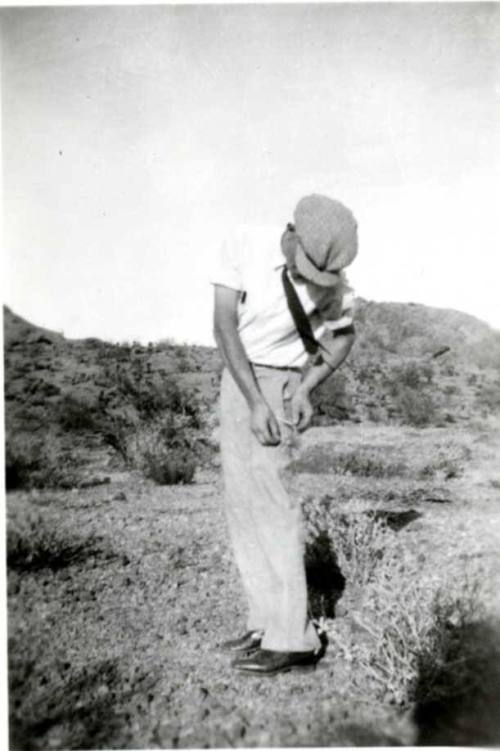 Frank Raymond removing Cactus from his Pants