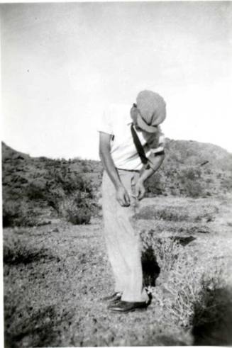 Frank Raymond removing Cactus from his Pants