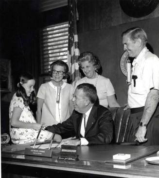 Minnie Raymond and Others inside of Governor Jack Williams Office