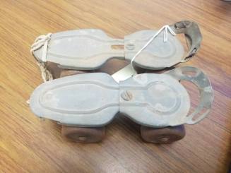 Roller Skates, adjustable buckle on shoe.