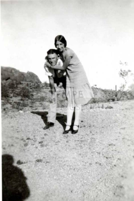 Minnie Laird and Frank Raymond Posing on a Hill