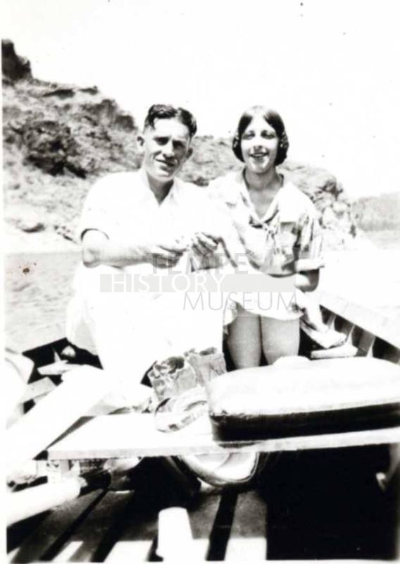 Minnie and Frank Raymond in a Boat on the Lake