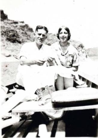 Minnie and Frank Raymond in a Boat on the Lake