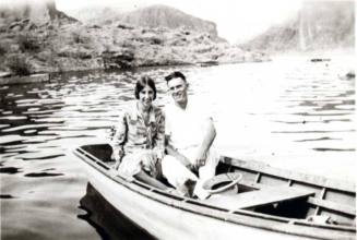 Frank and Minnie Raymond Boating on a Lake