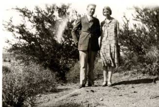 Frank and Minnie Raymond Pose in the Brush