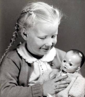 Young Girl with Baby Doll