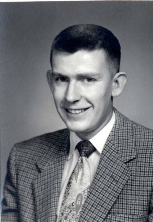 Portrait photo of William Raymond