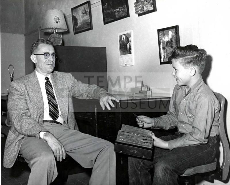 Frank Raymond with a Student