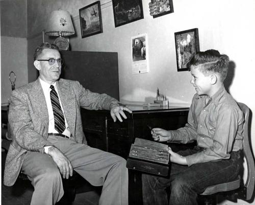 Frank Raymond with a Student