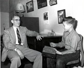 Frank Raymond with a Student