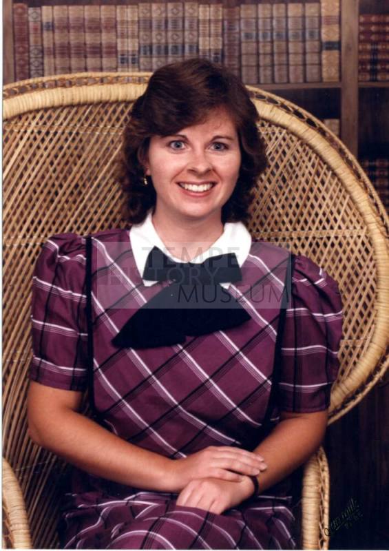 Woman Poses in Chair