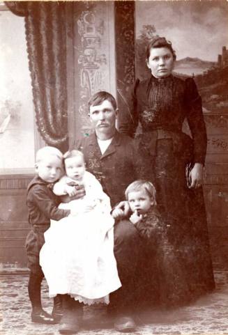 Uncle Halick and Family Pose for a Family Portrait