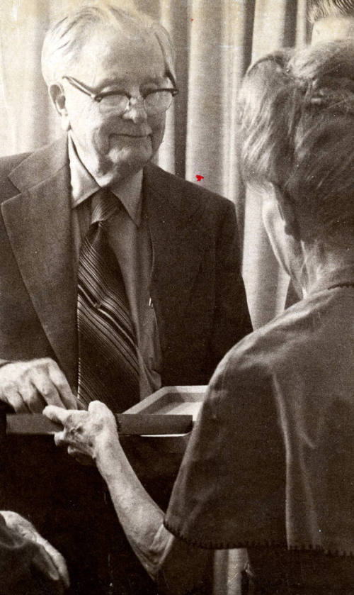 Photograph - Woman presenting a Plaque to Andersen(?)
