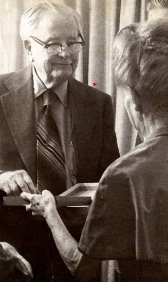 Photograph - Woman presenting a Plaque to Andersen(?)