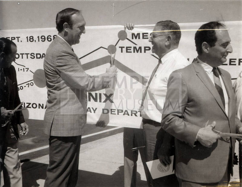 Photograph - Elmer Bradley holding scissors for dedication ceremony.